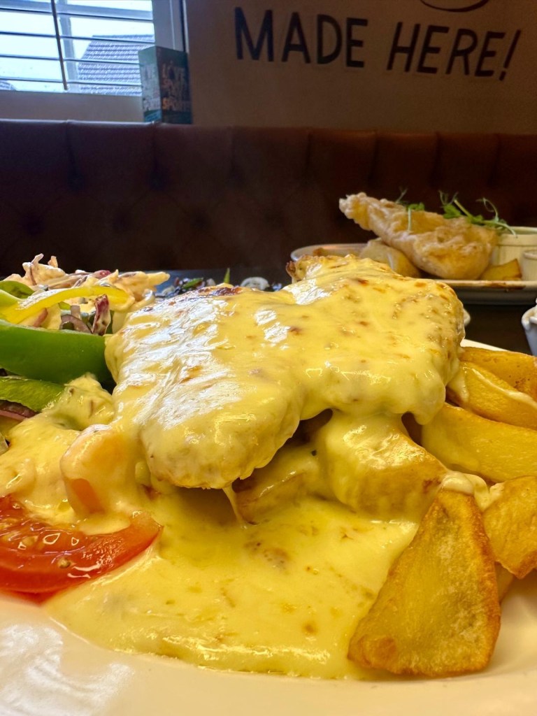 Cheesy chicken parmo with chips at The Gate pub in Durham