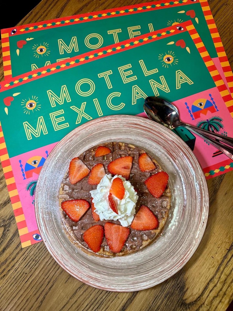 Strawberry waffle dessert with ice cream at Motel Mexicana Newcastle