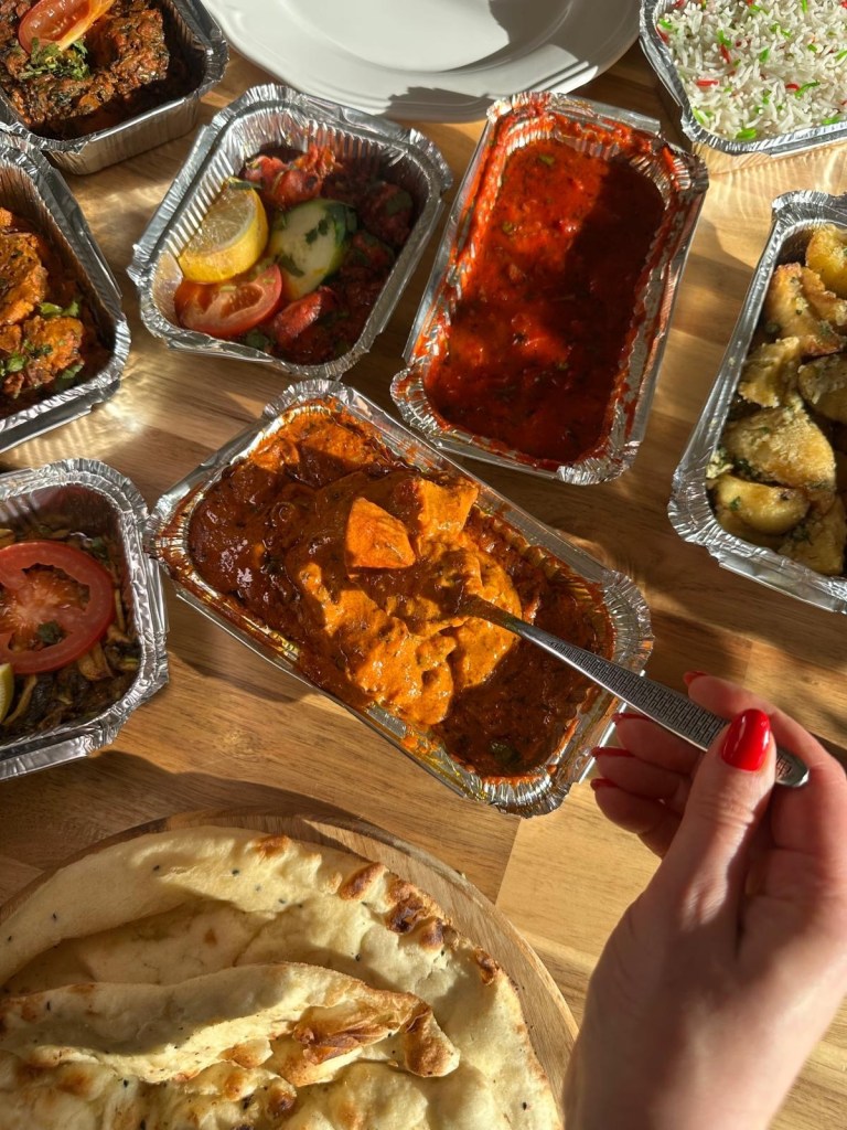 Spicy tikka chicken jhal mos curry with thick sauce from Nisha’s Tandoori