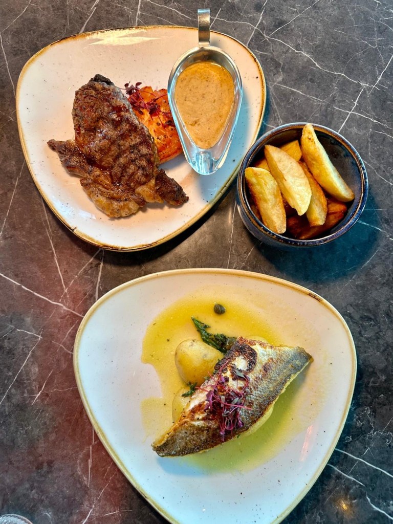 8oz rump steak with chips and sea bass fillet with potatoes and samphire at 3Sixty Newcastle