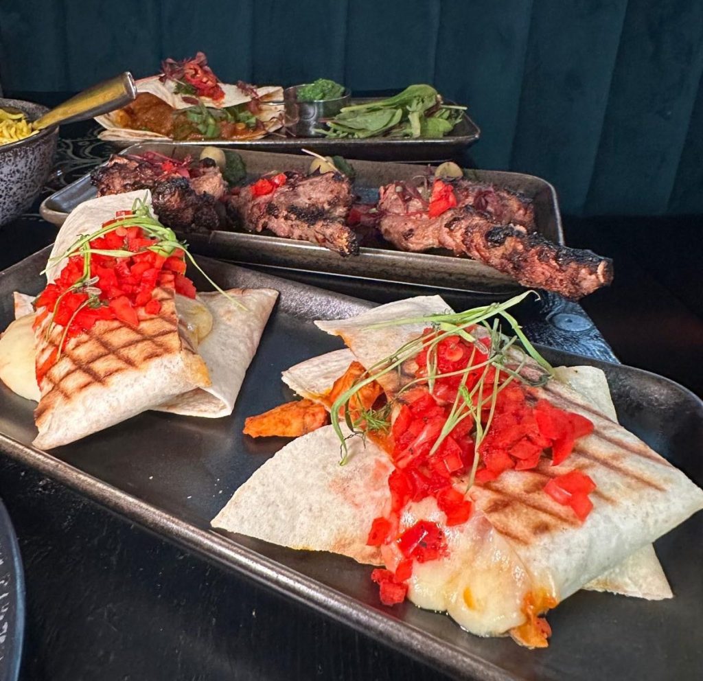 Chicken tikka quesadilla with melted cheese and Indian spices