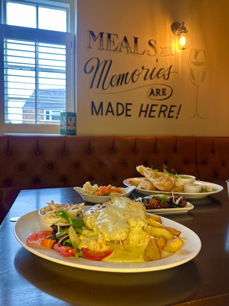 Cheesy chicken parmo with chips at The Gate pub in Durham