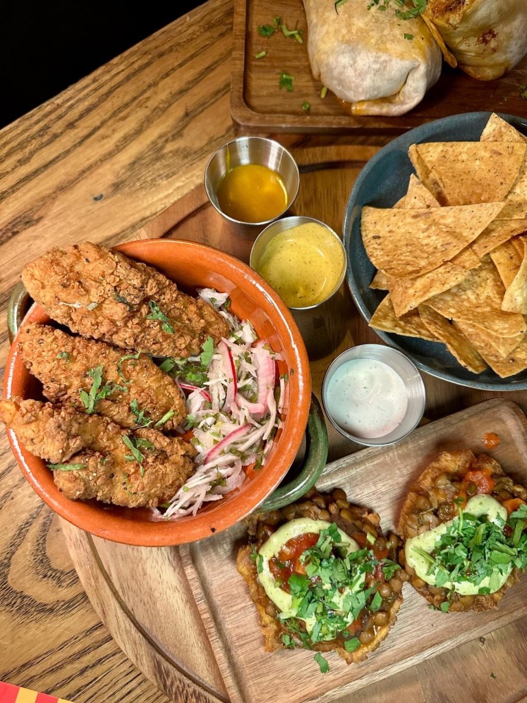 Crispy chicken tenders with honey mustard dip at Motel Mexicana Newcastle