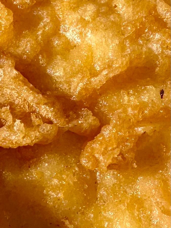 Close-up of golden battered cod from Krispies Fish & Chips in Forest Hall