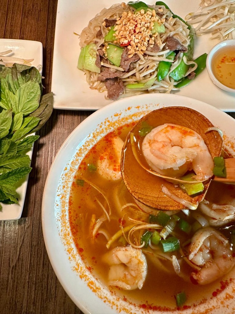 Hot and spicy king prawn pho and wok-fried beef noodles at Pho Newcastle