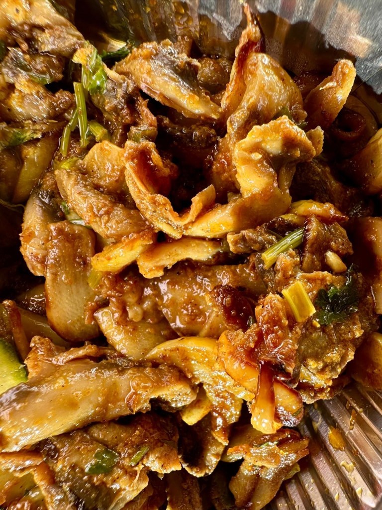 Creamy garlic mushrooms on puri from Nisha’s Tandoori takeaway