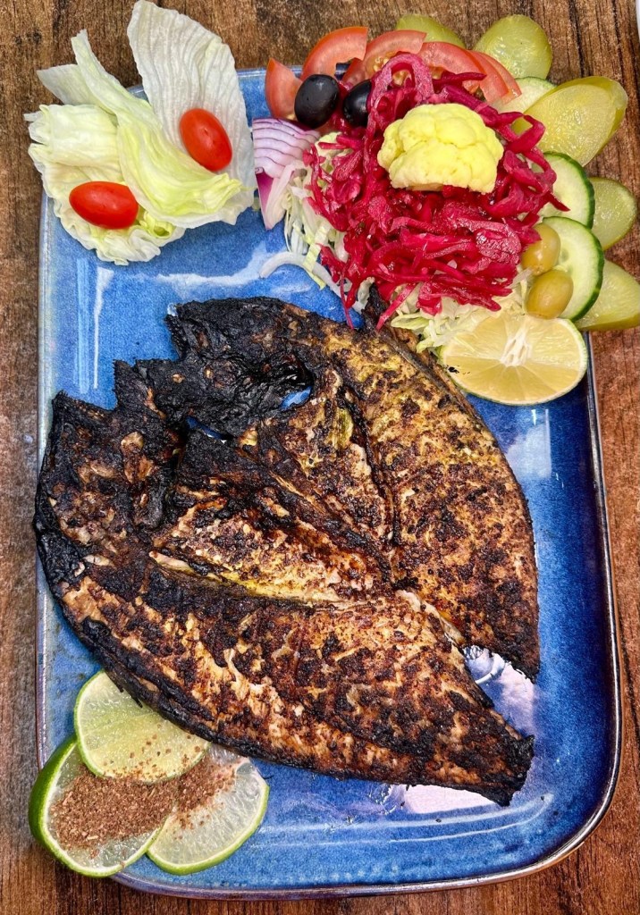 Grilled sea bream with rice and salad at Rose Restaurant Newcastle