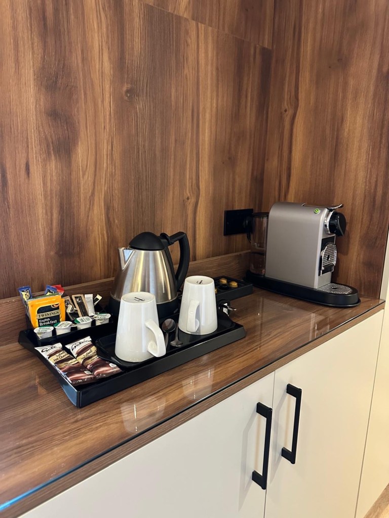 Coffee and tea making station in hotel room at Radisson Blu Durham
