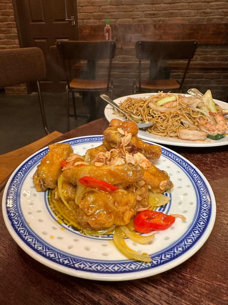 Crispy Vietnamese-style chicken wings glazed in fish sauce, served at Ngon Café Newcastle.