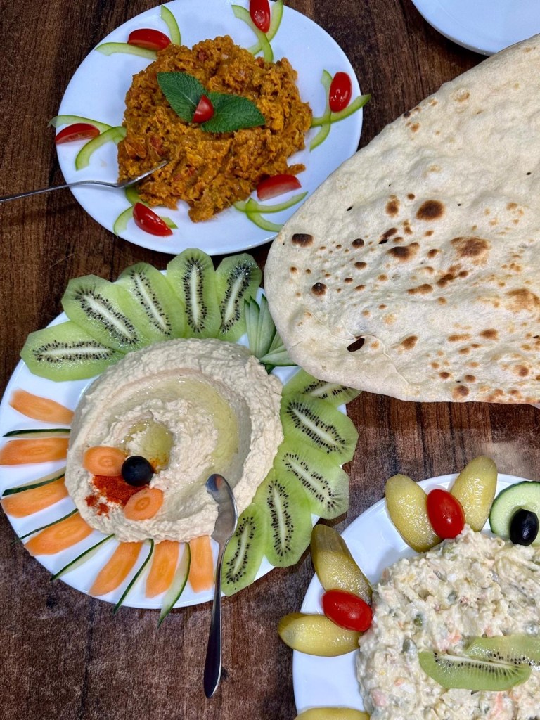 Trio of Persian starters with warm naan at Rose Restaurant Newcastle