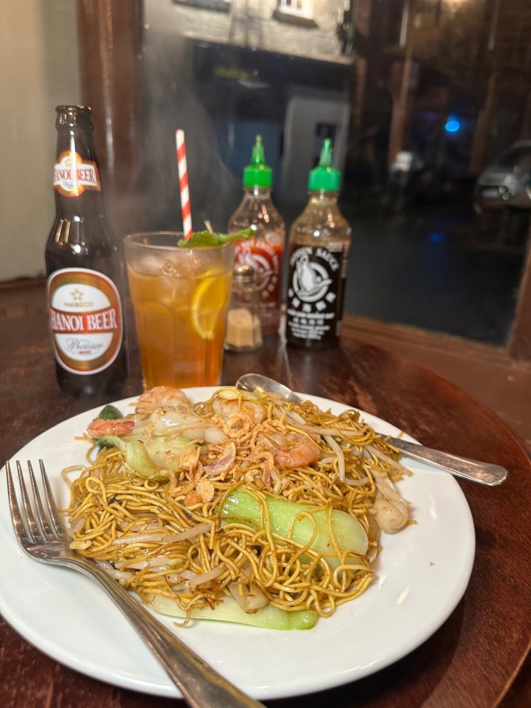 Close-up of juicy king prawns, grilled and seasoned with Vietnamese spices at Ngon Café Newcastle.