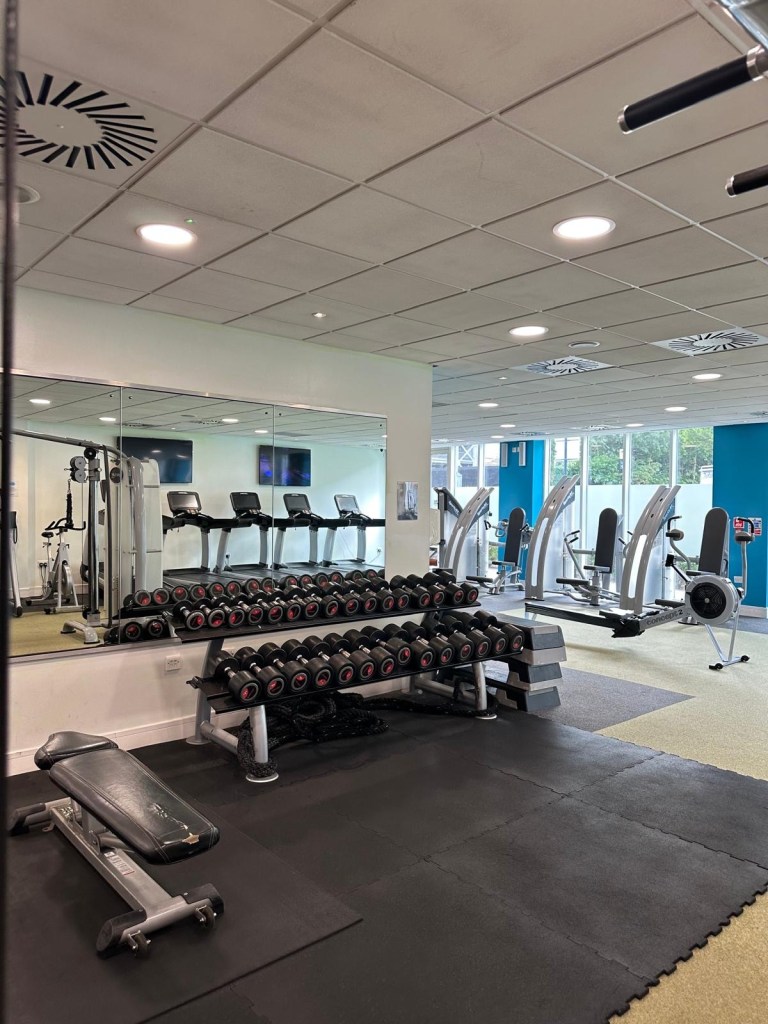 Well-equipped hotel gym at Radisson Blu Durham with cardio and weight equipment