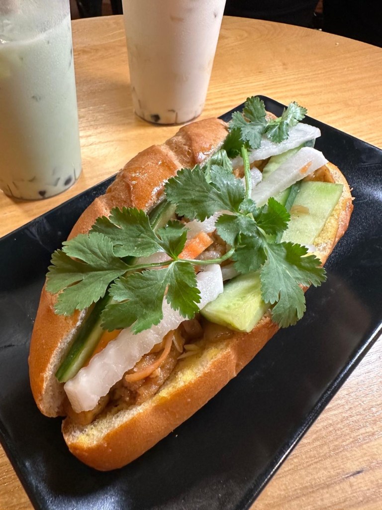 Traditional Vietnamese bánh mì filled with tofu, pickled veg, coriander and chilli sauce, served in house-made bread at Ngon Bánh Mì Newcastle.