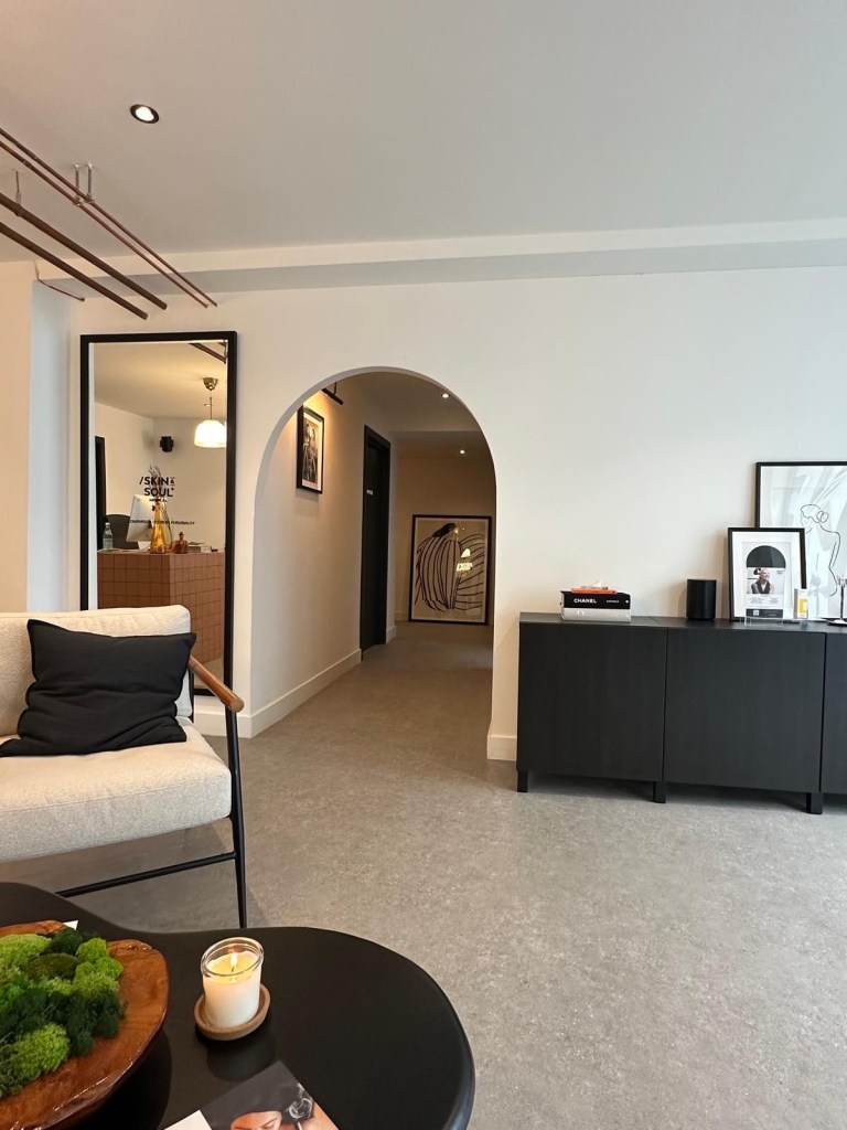 Skin & Soul Medical Newcastle reception area with modern minimalist decor, soft lighting, and welcoming atmosphere