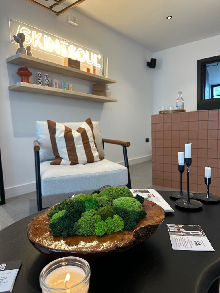 Welcoming reception space at Skin & Soul Medical Newcastle with stylish seating and calming aesthetic