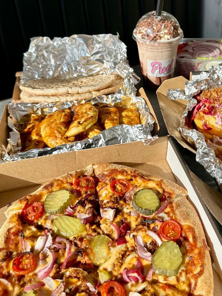 Caspian Kebab takeaway dishes including kebabs, wraps, and sides