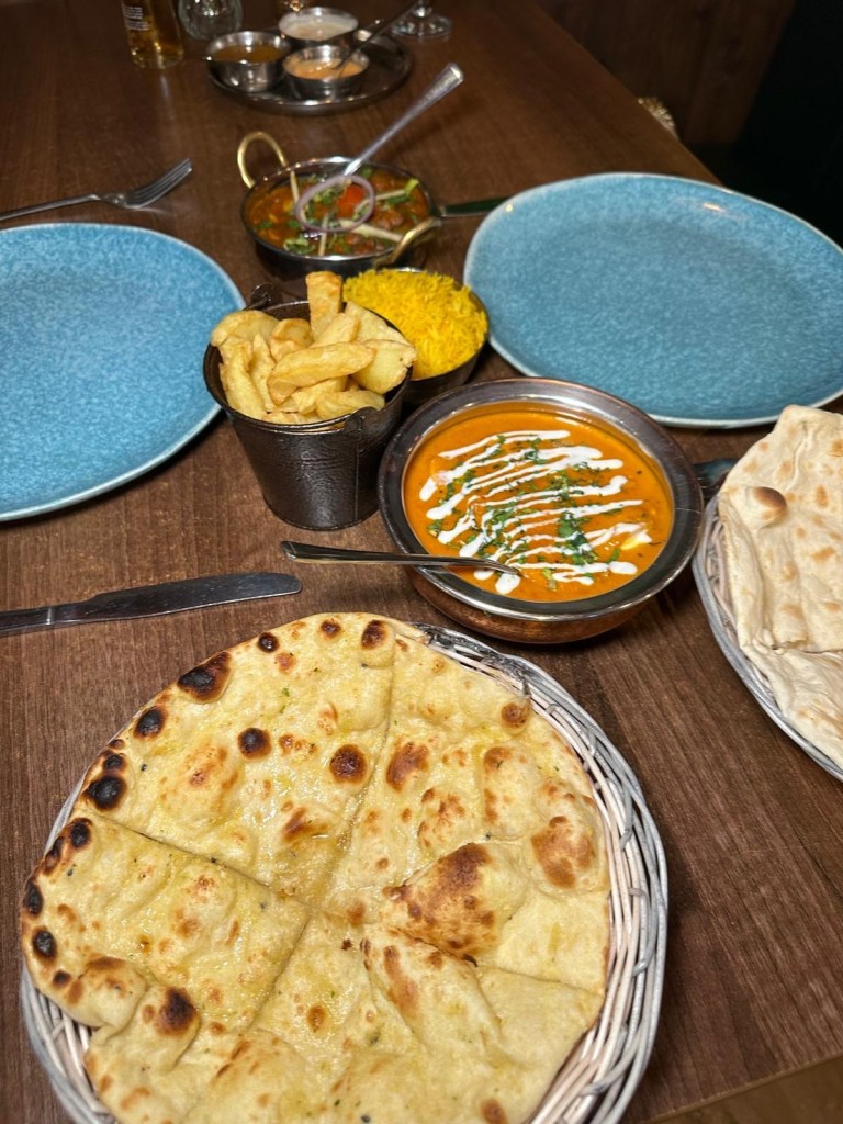 Chicken tikka masala at Babaji Sunderland with rich tomato curry sauce