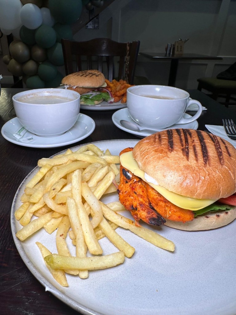 Peri Peri Chick burger at Olive Kitchen Newcastle with marinated chicken breast, fresh toppings, and fries.