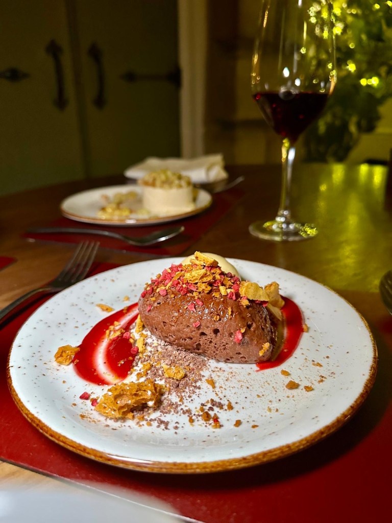 Chocolate mousse dessert with blood orange sorbet at Lumley Castle Hotel restaurant.