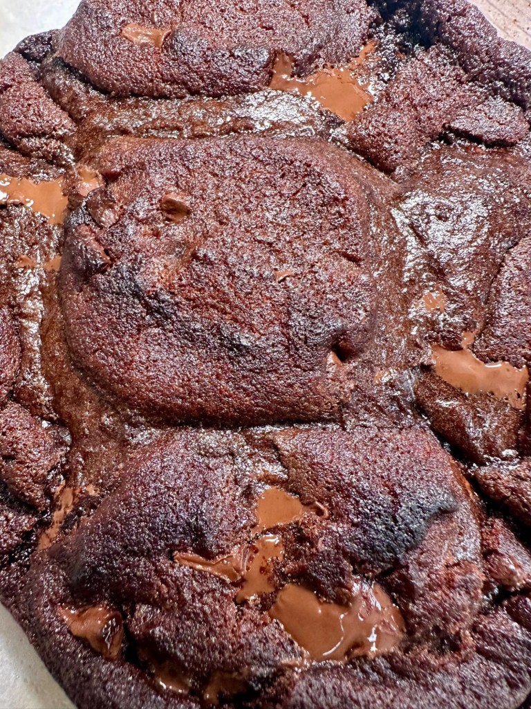 Warm double chocolate slab cookie with gooey melted centre from Slab Shop Newcastle.