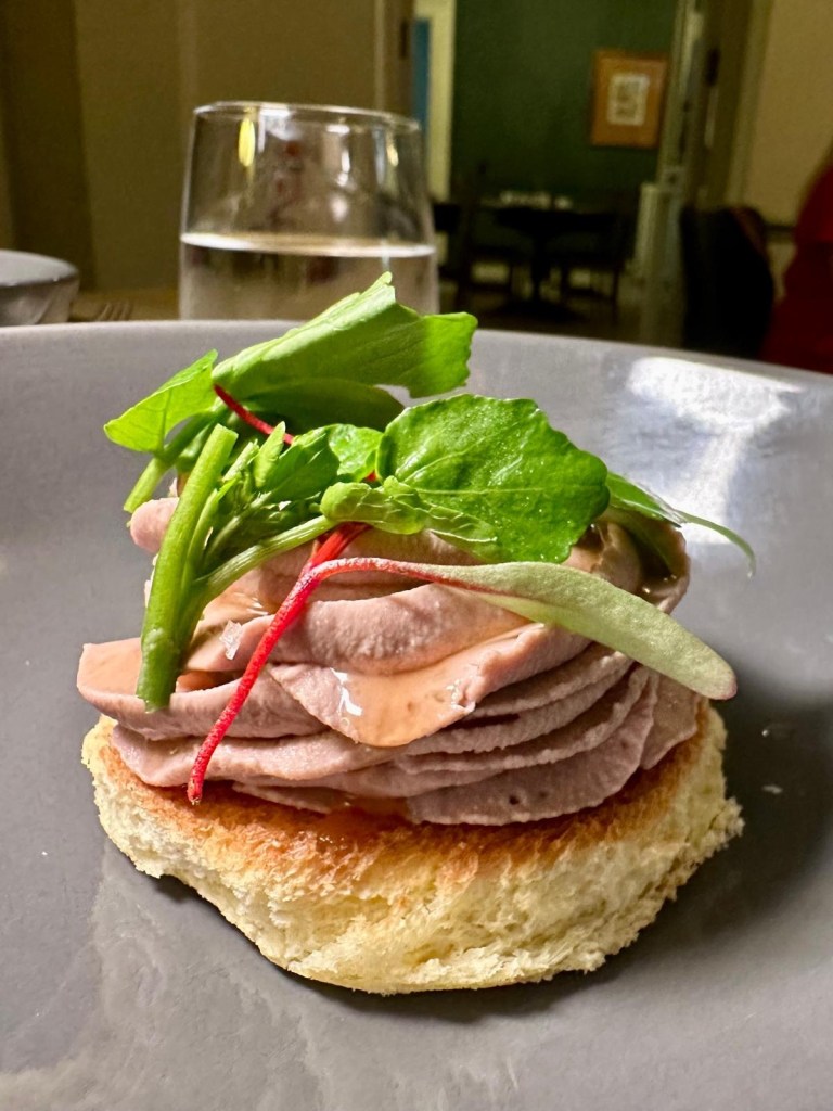 Smooth chicken liver parfait with Madeira glaze and toasted brioche.