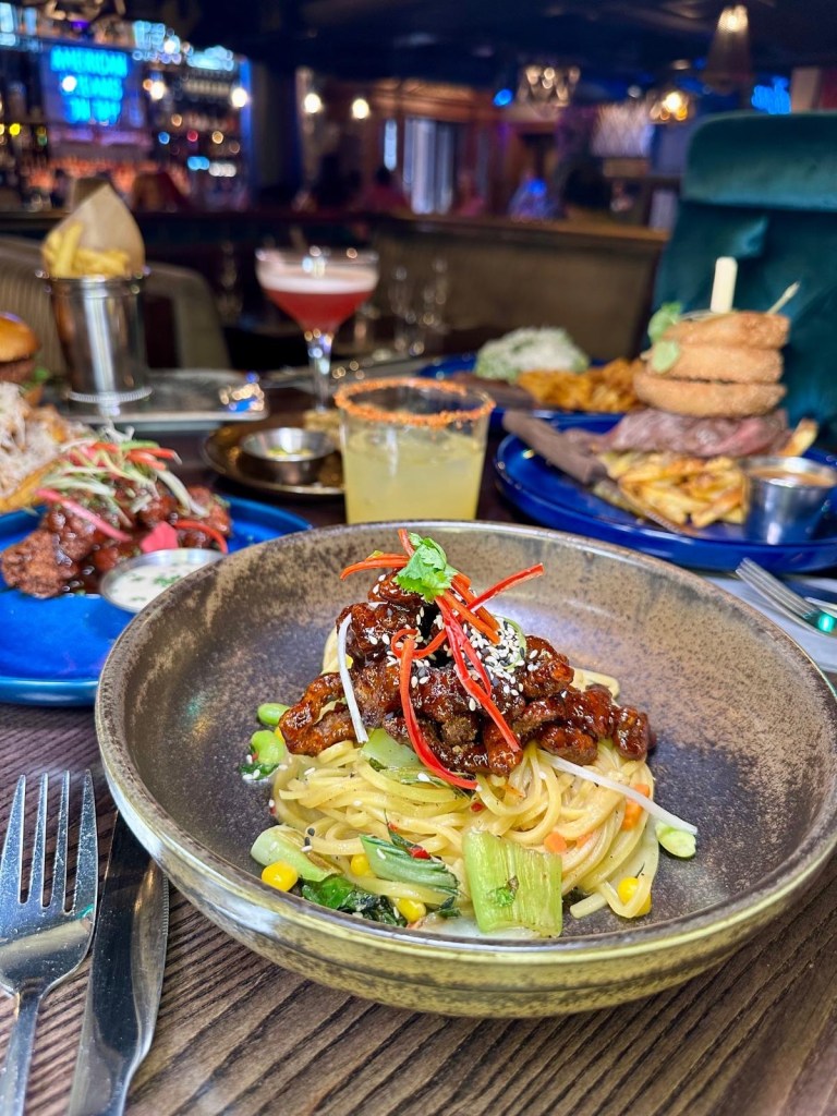 Send Noods dish at Manahatta Newcastle with crispy sticky beef, stir-fried noodles, pak choi, miso and chilli.