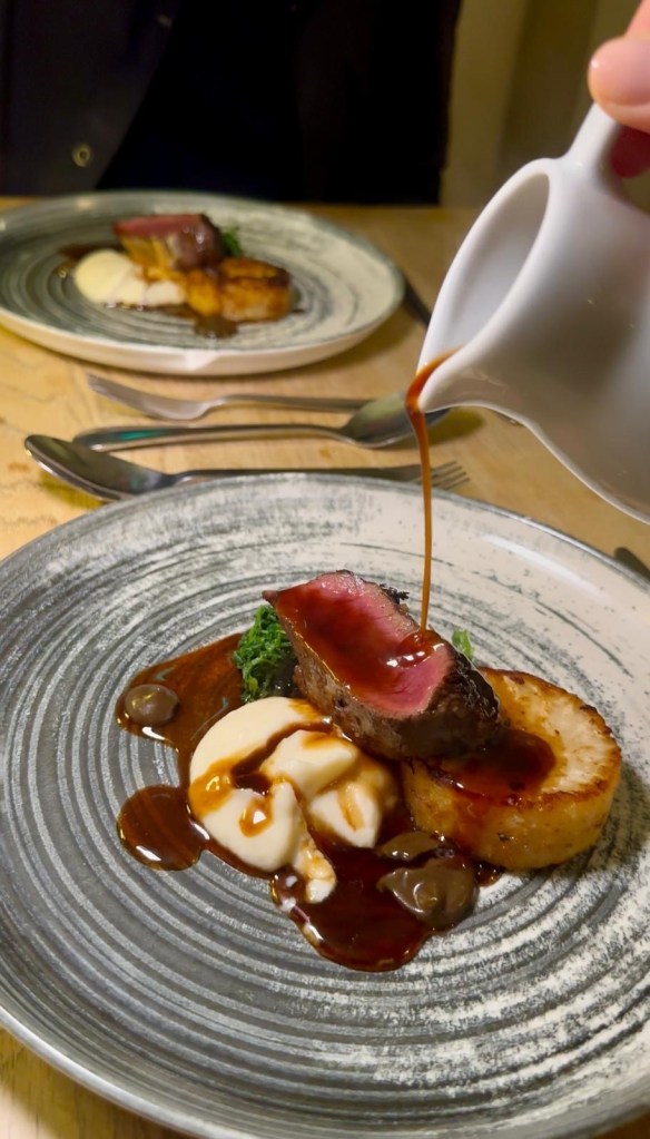 Loin of venison with celeriac fondant, pickled walnuts and rich jus.