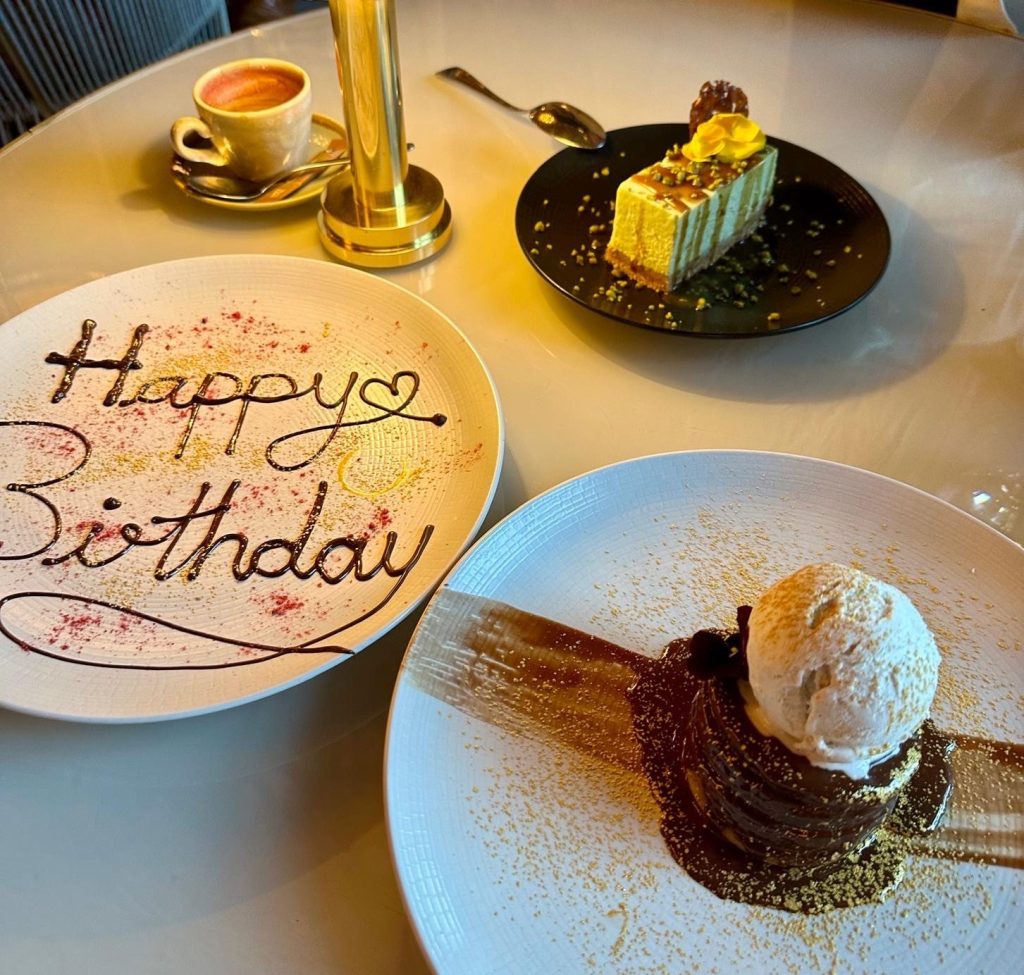Happy birthday dessert plate with two desserts at Victors Newcastle