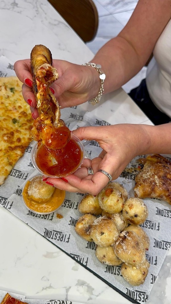 Firestone Pizza calzone dipped in sauce at Fenwick Food Hall Newcastle