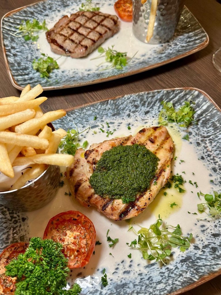 Steak and chicken main dishes served at Cast Iron Bar & Restaurant in Delta Hotels by Marriott Newcastle Gateshead.