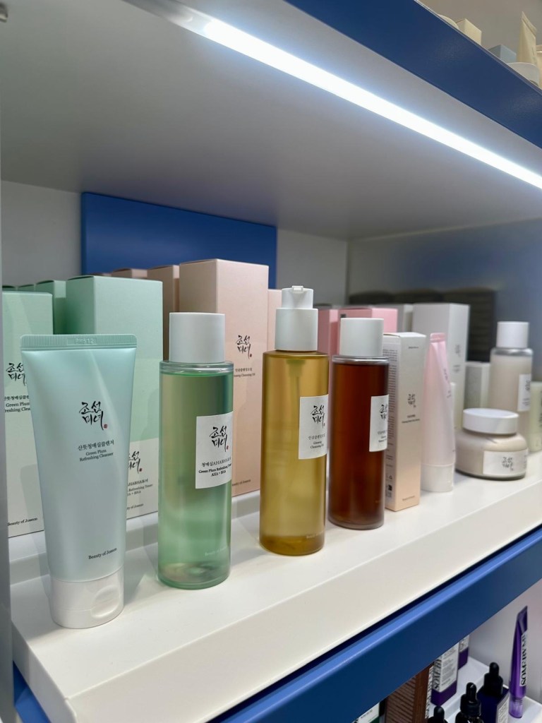 K-beauty skincare products displayed on shelves at Pure Seoul Newcastle in Eldon Square.