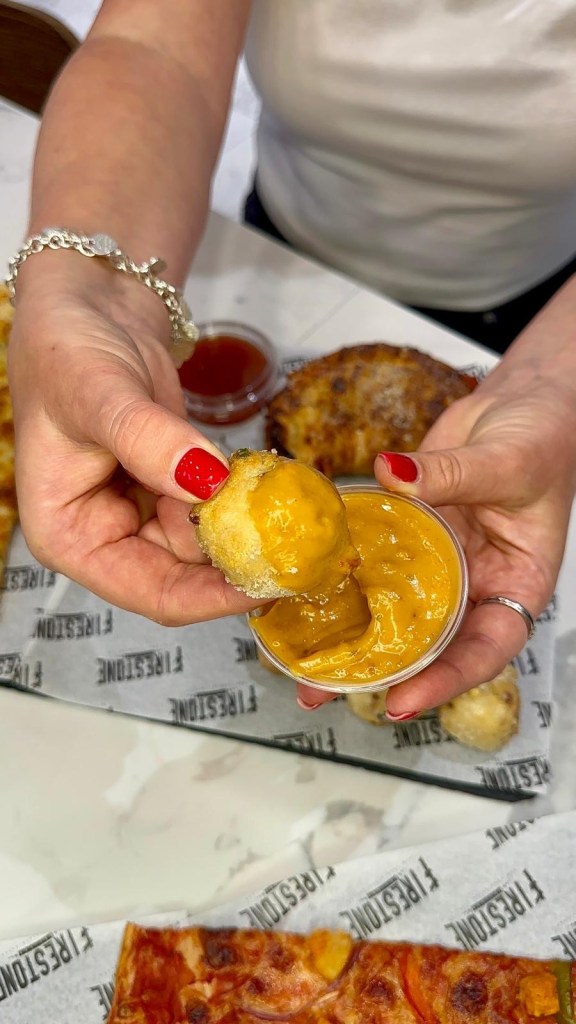 Firestone Pizza dough ball dipped in sauce at Fenwick Food Hall Newcastle