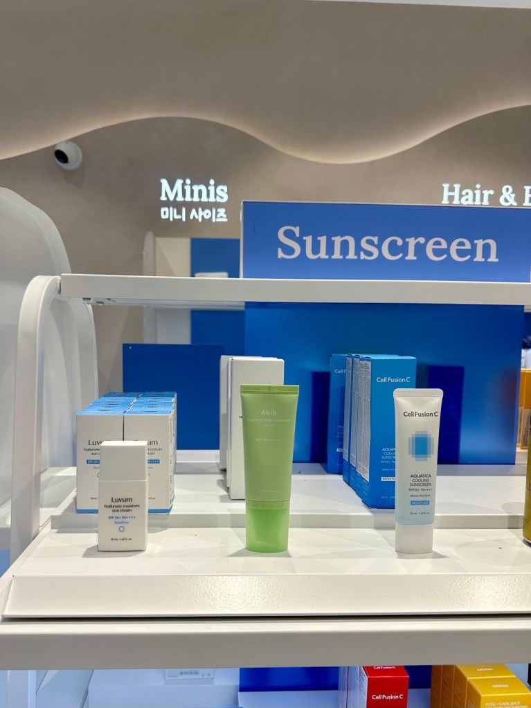 Rows of Korean beauty products neatly arranged on shelving at Pure Seoul Newcastle.