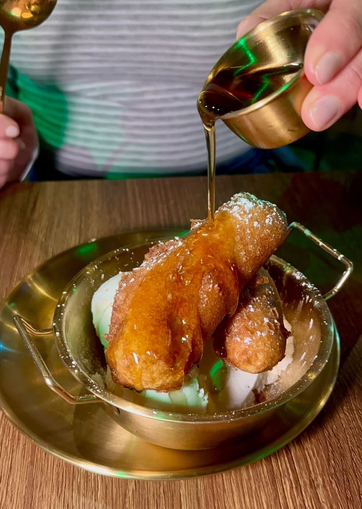 Crispy banana fritter dessert with ice cream at Scott and Wilson North Shields