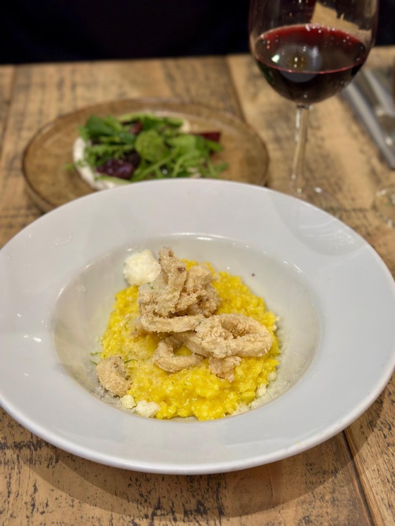 Crispy North Sea squid with creamy risotto, Manchego cheese and lime at Hinnies restaurant Whitley Bay