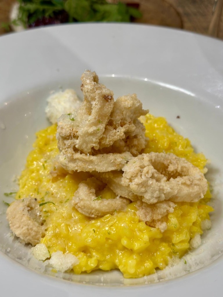 Crispy North Sea squid with creamy risotto, Manchego cheese and lime at Hinnies restaurant Whitley Bay
