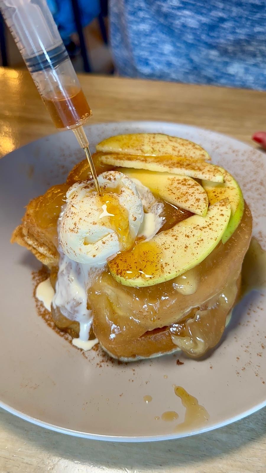 Apple cinnamon crumble French toast with maple syrup and vanilla ice cream at The Dispensary Newcastle