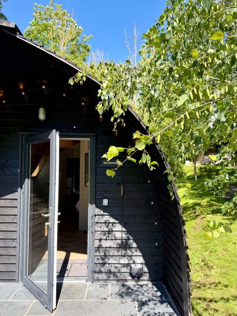Scandinavian style cabin exterior at Hewn Yorkshire in the North Yorkshire countryside
