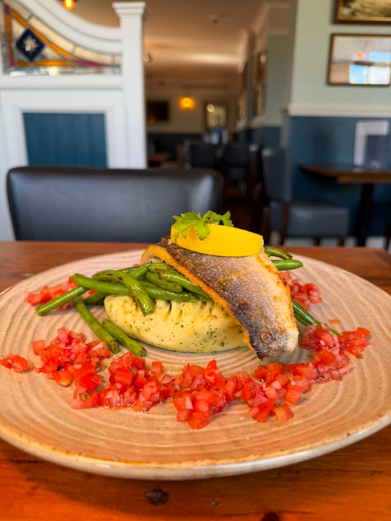 Pan seared seabass with tomato salsa, parsley mash and green beans at The Queen's Head Cullercoats