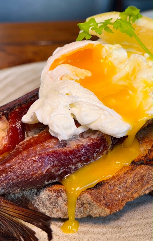 Craster kipper with poached eggs on toasted sourdough at The Queen's Head Cullercoats